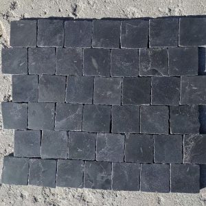 Honed square black limestone tiles